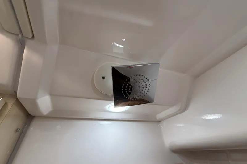 Slide: The Image of Showerhead in 2026 Regal 36 Grande Coupe yacht bathroom, featuring modern design and sleek finish. - 81