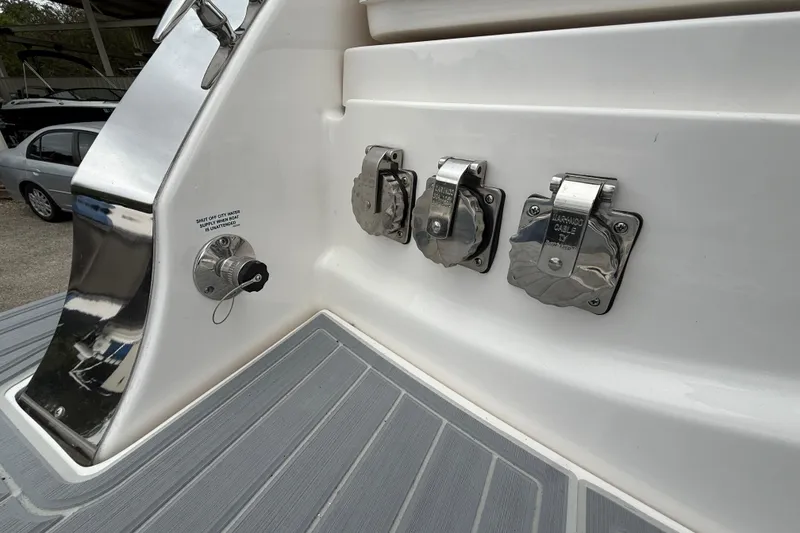 Slide: The Image of 2026 Regal 36 Grande Coupe boat utility connections on deck. - 9