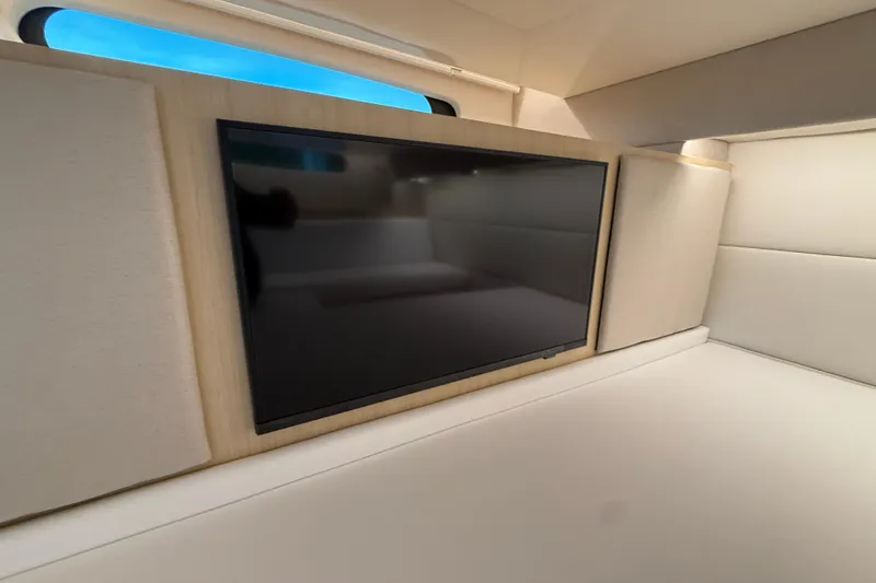 Slide: The Image of Interior of 2026 Regal 36 Grande Coupe with wall-mounted TV and modern design. - 97