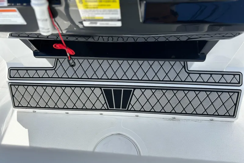 Slide: The Image of 2023 Wellcraft 222 Scarab Offshore boat deck with diamond-patterned non-slip surface. - 13