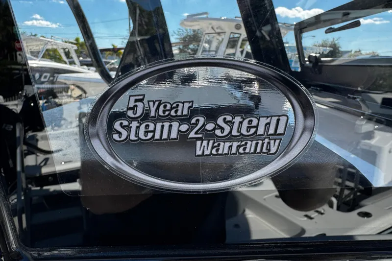 Slide: The Image of 2026 Sea Pro 242 Center Console with 5-year Stem-to-Stern warranty sticker. - 35
