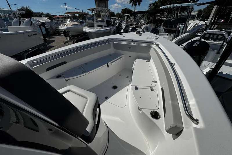 Slide: The Image of 2026 Sea Pro 242 Center Console boat interior, showcasing seating and deck features. - 36