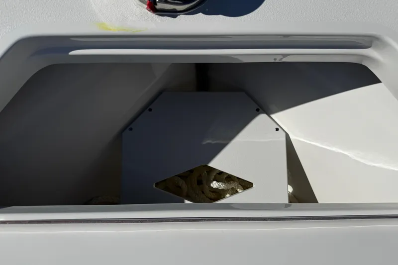 Slide: The Image of 2026 Sea Pro 242 Center Console storage compartment detail. - 44
