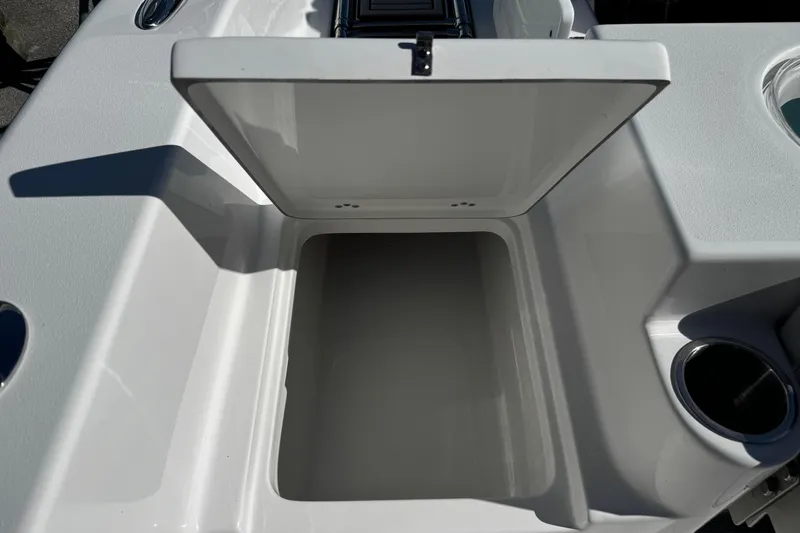 Slide: The Image of Open storage compartment on 2026 Sea Pro 242 Center Console boat. - 8