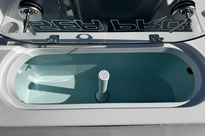 Slide: The Image of Livewell on 2026 Sea Pro 242 Center Console boat, featuring aeration system. - 9