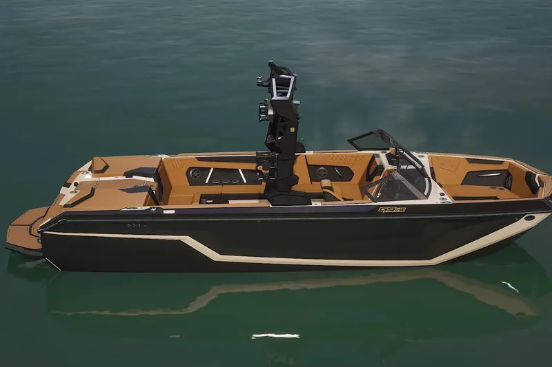 Slide: The Image of 2026 Nautique Super Air Nautique GS24 boat on calm water, featuring sleek design and modern amenities. - 3