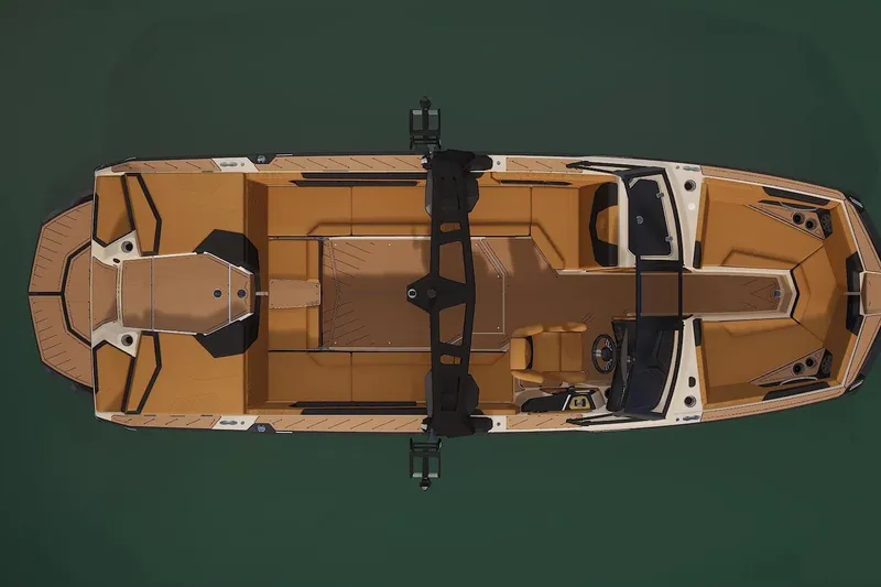 Slide: The Image of 2026 Nautique Super Air Nautique GS24 boat, top view, tan interior, sleek design. - 5