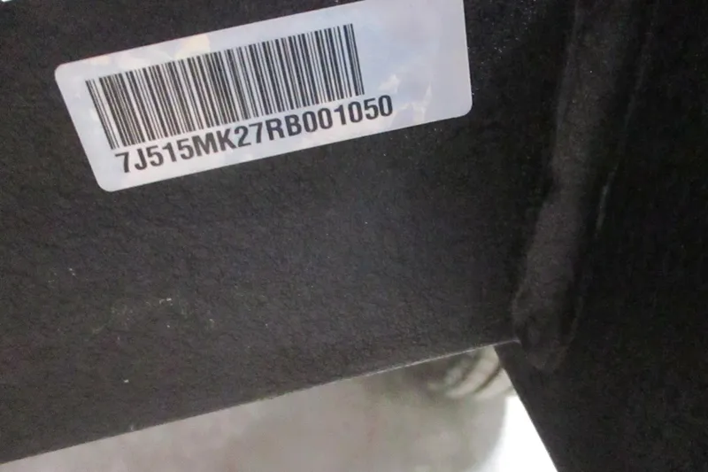 Slide: The Image of Barcode and serial number on 2024 Tahoe 1950 vehicle component. - 13