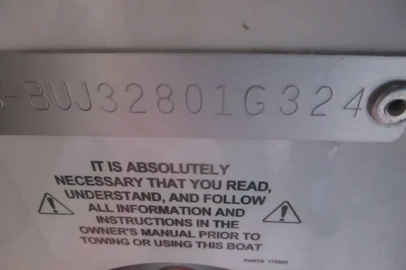Slide: The Image of Serial number and safety warning on Tahoe 1950 boat, 2024 model. - 14