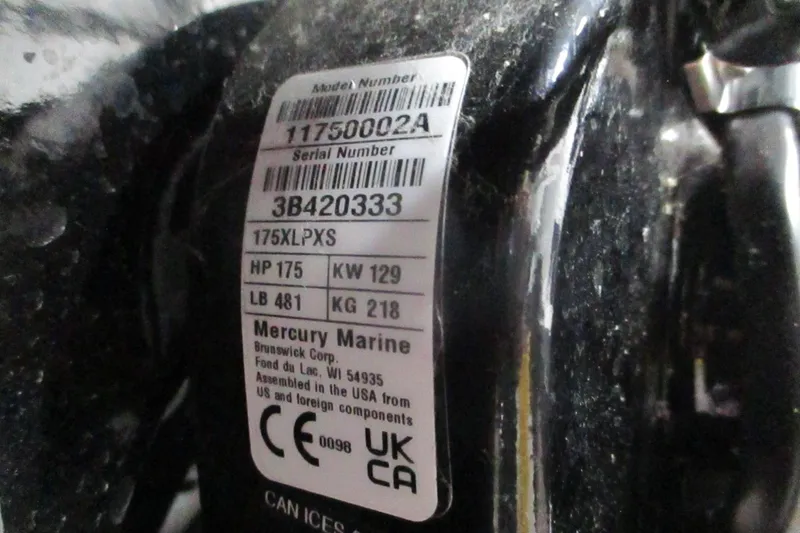 Slide: The Image of Label on Mercury Marine engine with model and serial numbers, specifications, and compliance marks. - 15