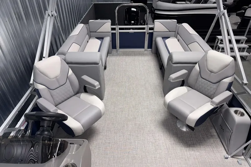 Slide: The Image of 2026 Avalon Venture 2385 QL pontoon boat interior with luxurious seating and modern design. - 13