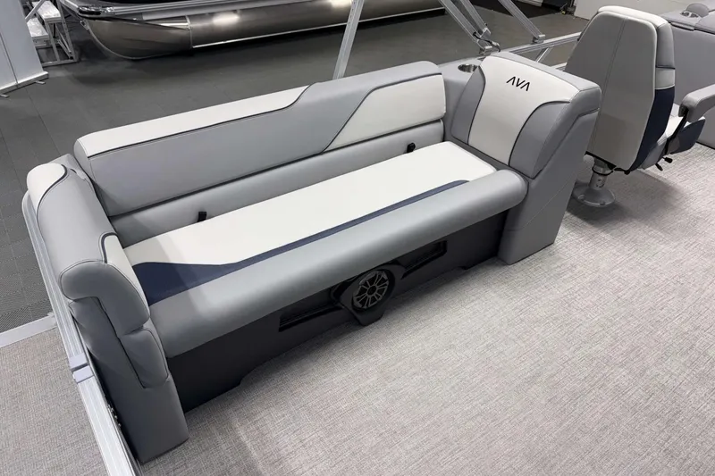 Slide: The Image of 2026 Avalon Venture 2385 QL boat interior with sleek gray seating and modern design. - 19