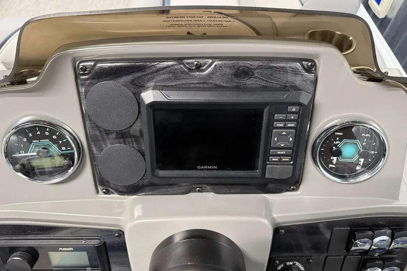 Slide: The Image of Dashboard of 2026 Avalon Venture 2385 QL with Garmin display and gauges. - 20