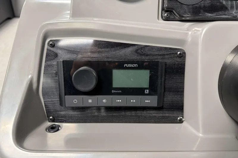 Slide: The Image of Control panel of 2026 Avalon Venture 2385 QL with Fusion audio system. - 21