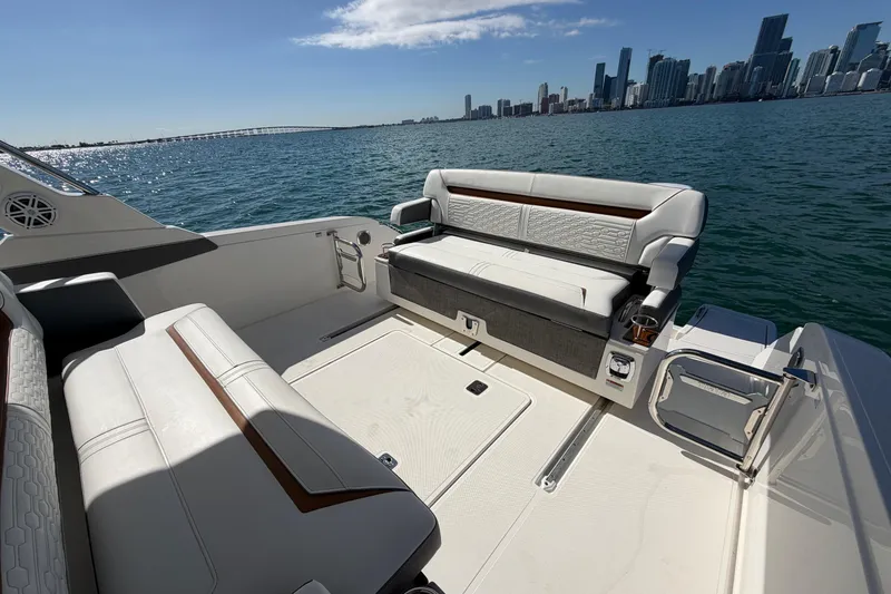 Slide: The Image of Luxurious 2022 Tiara Yachts 34 LS interior with city skyline view. - 12