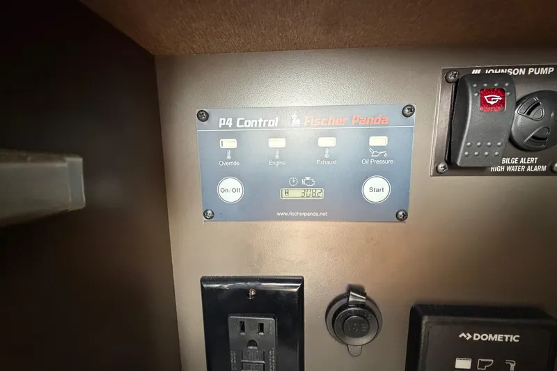 Slide: The Image of Control panel of a 2022 Tiara Yachts 34 LS featuring Fischer Panda P4 system. - 36