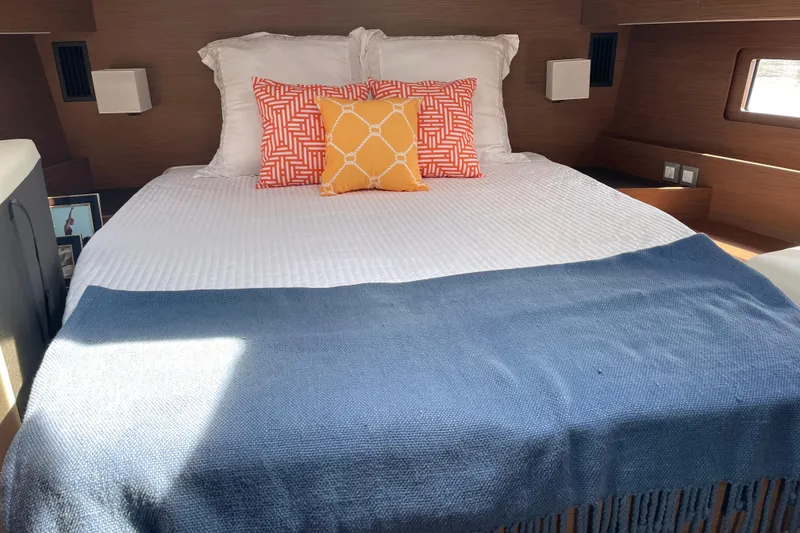 Slide: The Image of Luxurious cabin interior of 2024 Beneteau Oceanis 51.1 yacht with stylish bedding. - 7