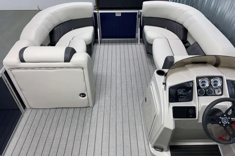 Slide: The Image of Luxurious interior of 2026 Sylvan Mirage 8522 LZ pontoon boat with plush seating and modern dashboard. - 5