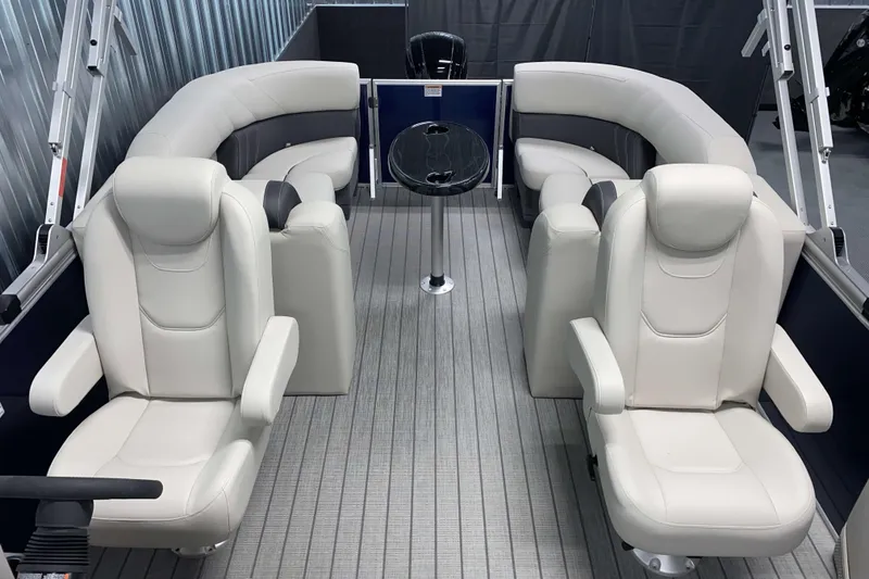 Slide: The Image of 2026 Sylvan Mirage 8522 LZ pontoon boat interior with luxurious seating and modern design. - 6