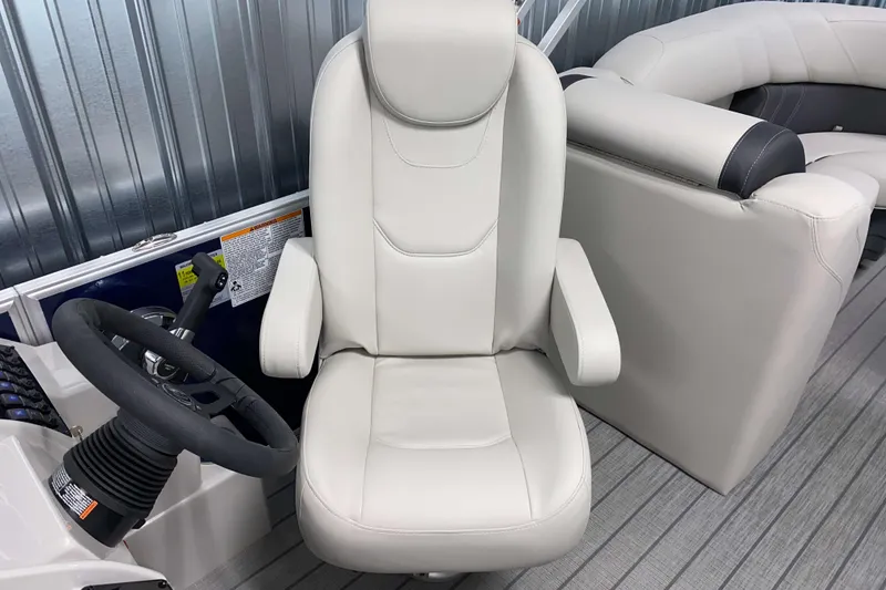 Slide: The Image of Captain's chair and steering wheel of 2026 Sylvan Mirage 8522 LZ pontoon boat. - 9