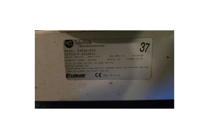 Slide: The Image of Label on Taylor Made Environmental unit, model SXR10-M10, for Sea Ray 310 Sundancer 2001. - 79