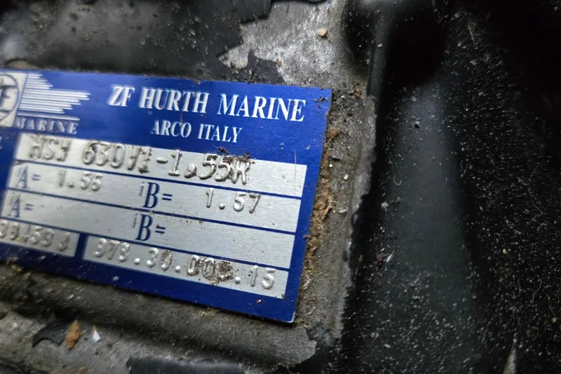 Slide: The Image of ZF Hurth Marine label on a 2001 Sea Ray 310 Sundancer boat component. - 89