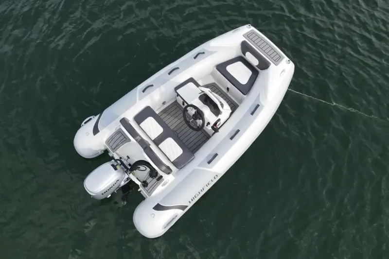 Slide: The Image of Manufacturer Provided Image: 2023 Highfield Sport 300 boat on water, aerial view. - 2
