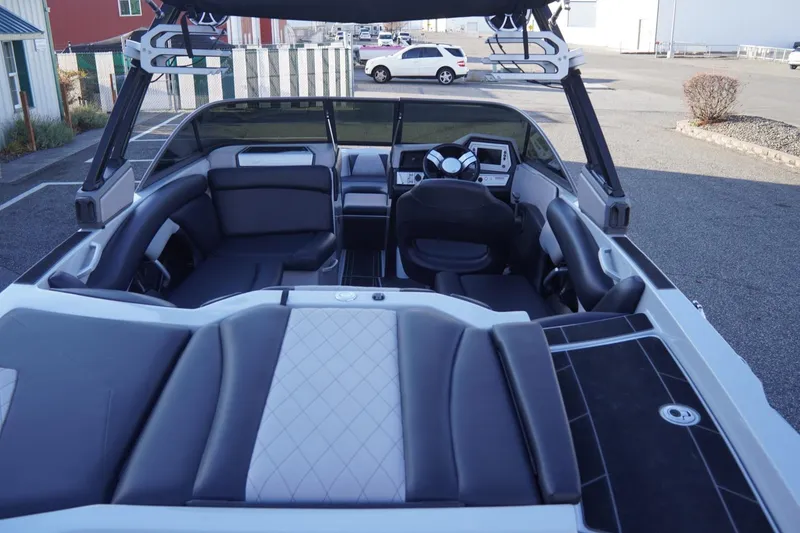 Slide: The Image of 2019 Tigé R20 boat interior with sleek seating and modern dashboard. - 10