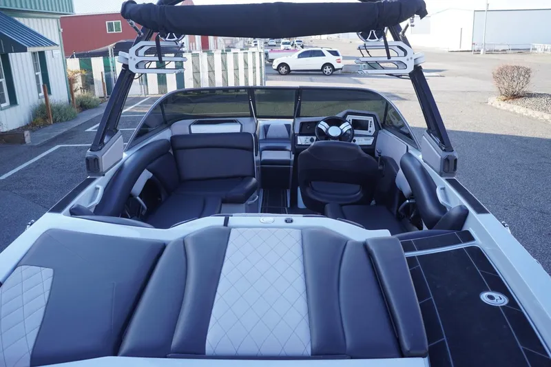 Slide: The Image of 2019 Tigé R20 boat interior with sleek seating and modern dashboard design. - 11