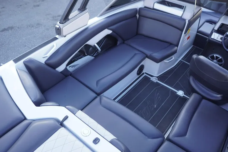 Slide: The Image of 2019 Tigé R20 boat interior with sleek black seating and modern design. - 15