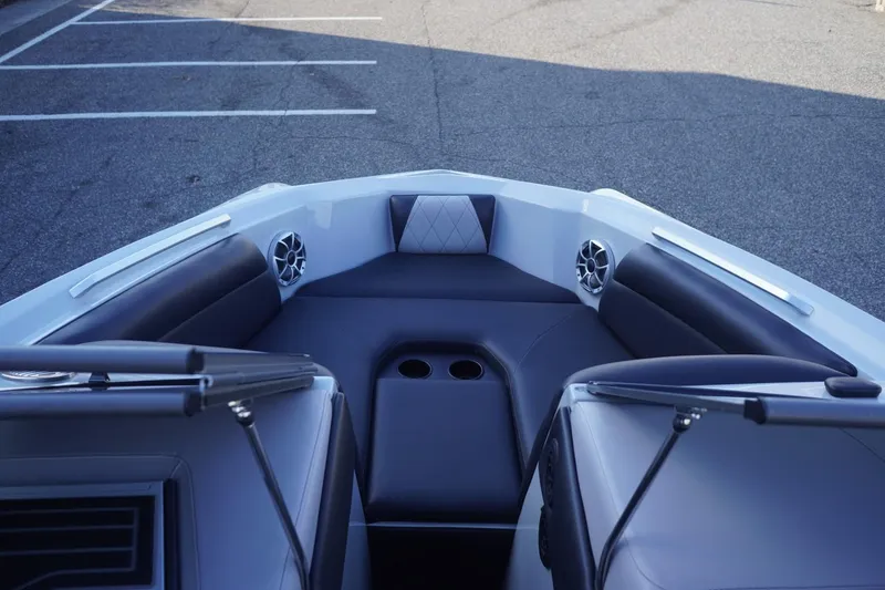 Slide: The Image of 2019 Tigé R20 boat interior with sleek seating and built-in speakers. - 21