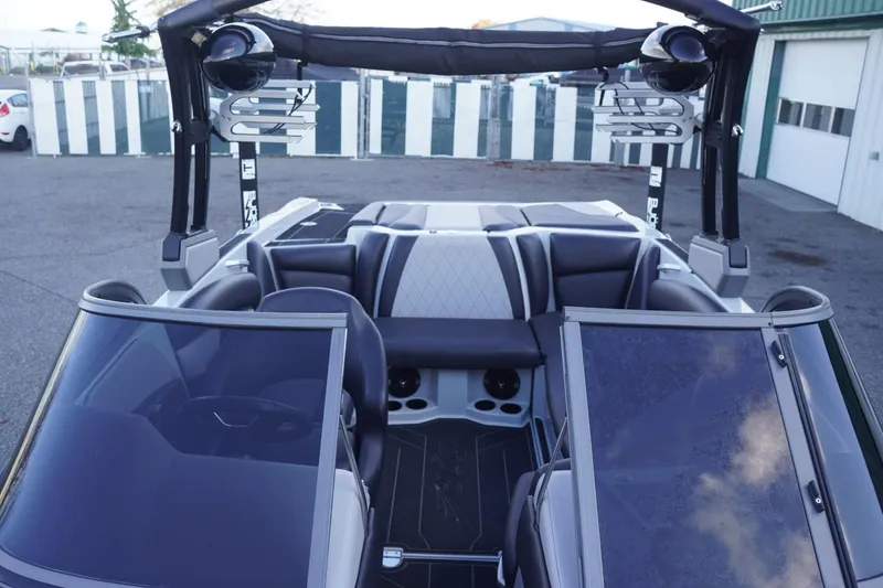 Slide: The Image of 2019 Tigé R20 boat interior with seating and wakeboard tower. - 24
