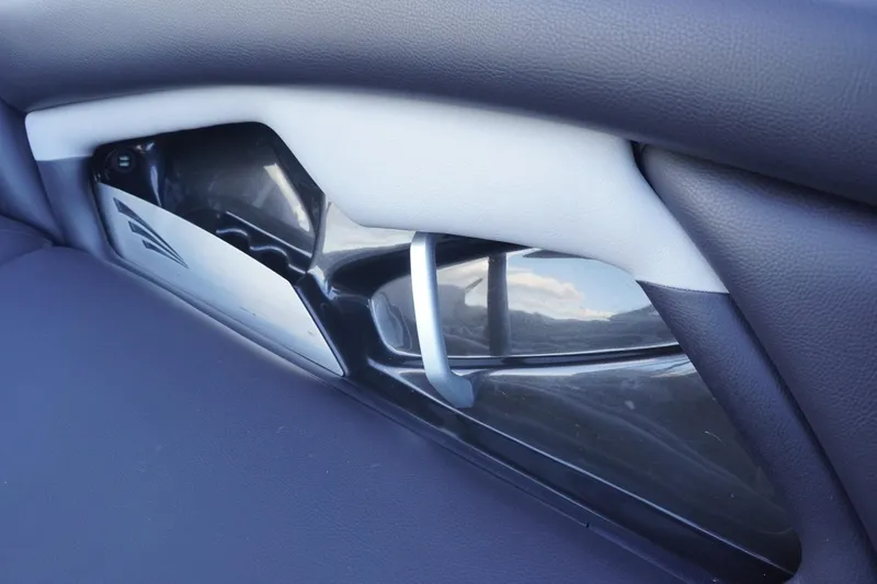 Slide: The Image of Interior detail of 2019 Tigé R20 boat, featuring sleek black and white design. - 31