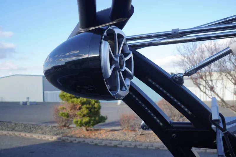 Slide: The Image of 2019 Tigé R20 boat speaker and tower detail against a clear sky. - 32