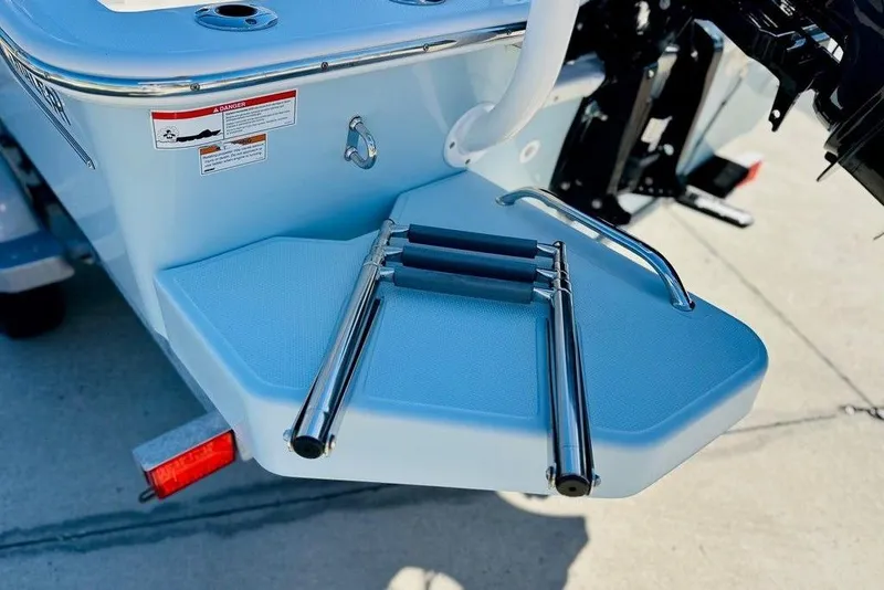 Slide: The Image of 2023 Boston Whaler 170 Montauk swim platform with foldable ladder. - 6