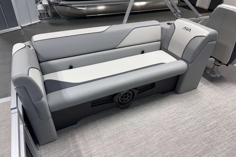 Slide: The Image of 2026 Avalon Venture 2385 QL Tritoon seating, featuring sleek gray and white upholstery. - 18