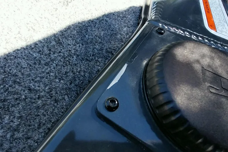 Slide: The Image of Close-up of Ranger ALPHA 208 (2025) interior detail with textured surface and warning label. - 18