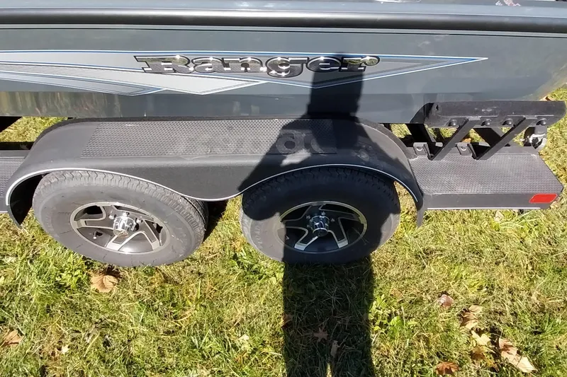 Slide: The Image of Trailer of 2025 Ranger ALPHA 208 with dual wheels on grass. - 21