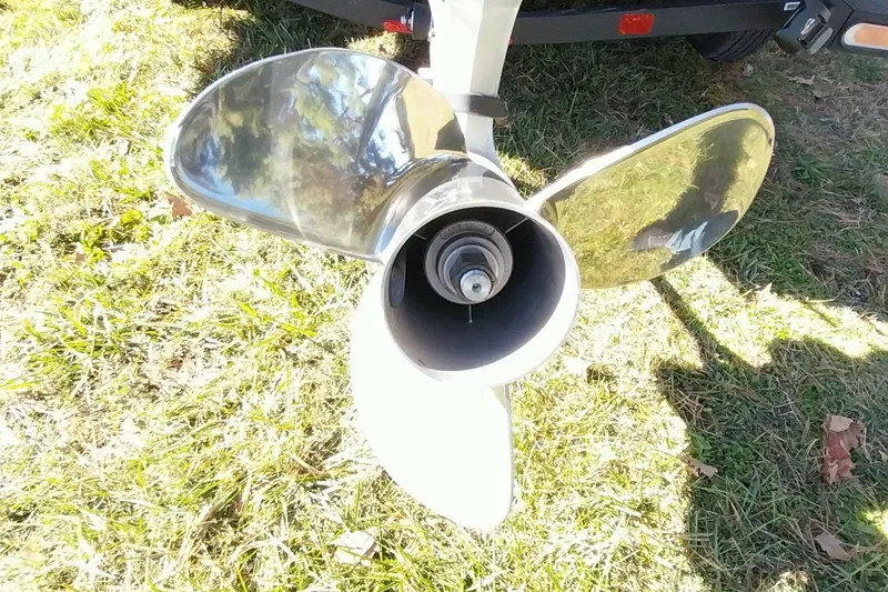 Slide: The Image of Shiny propeller of Ranger ALPHA 208 boat, 2025 model, on grassy ground. - 24