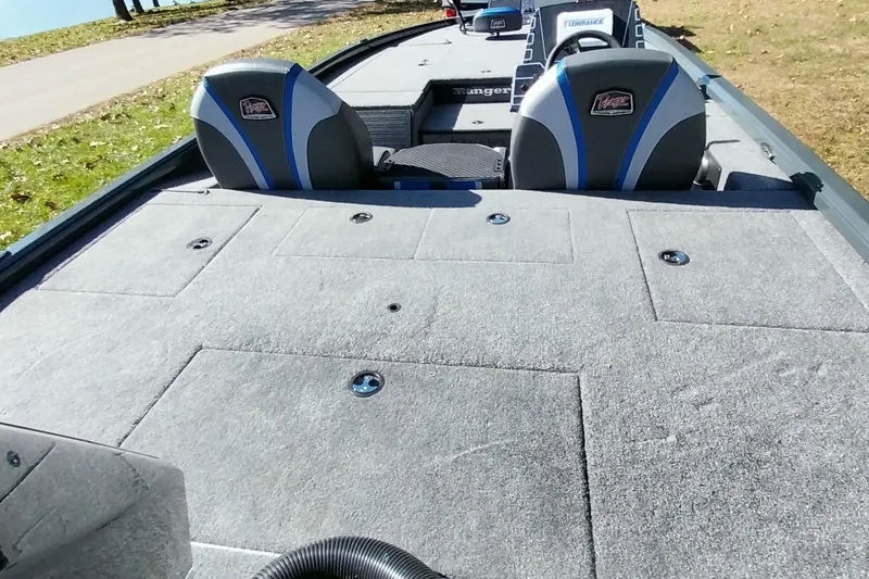 Slide: The Image of 2025 Ranger ALPHA 208 boat interior with spacious deck and dual seats. - 8