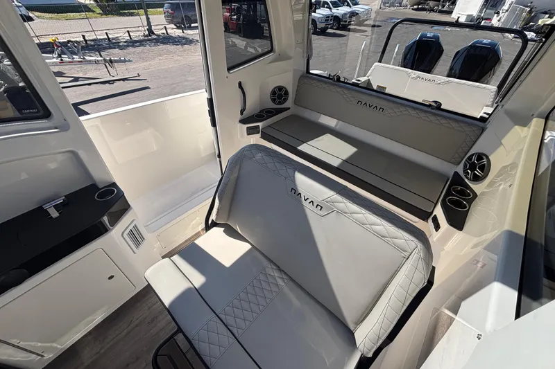 Slide: The Image of Interior of 2026 Navan C30 boat with modern seating and cup holders. - 17