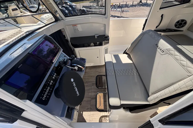 Slide: The Image of Interior of 2026 Navan C30 boat with modern controls and seating. - 18