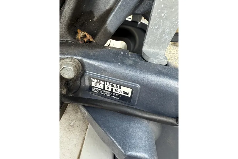Slide: The Image of Close-up of Yamaha F200X engine part on 2021 Chaparral 23 SSi boat. - 12