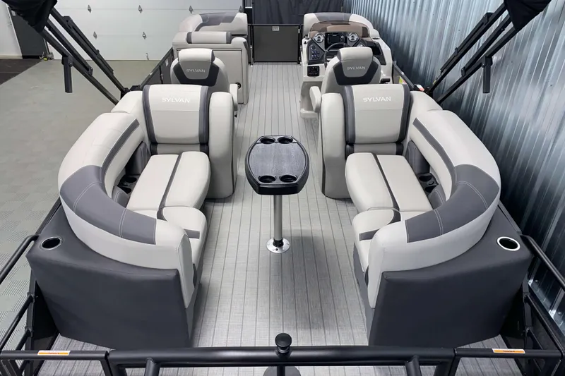 Slide: The Image of 2025 Sylvan L3 LZ pontoon boat interior with luxurious seating and modern design. - 12