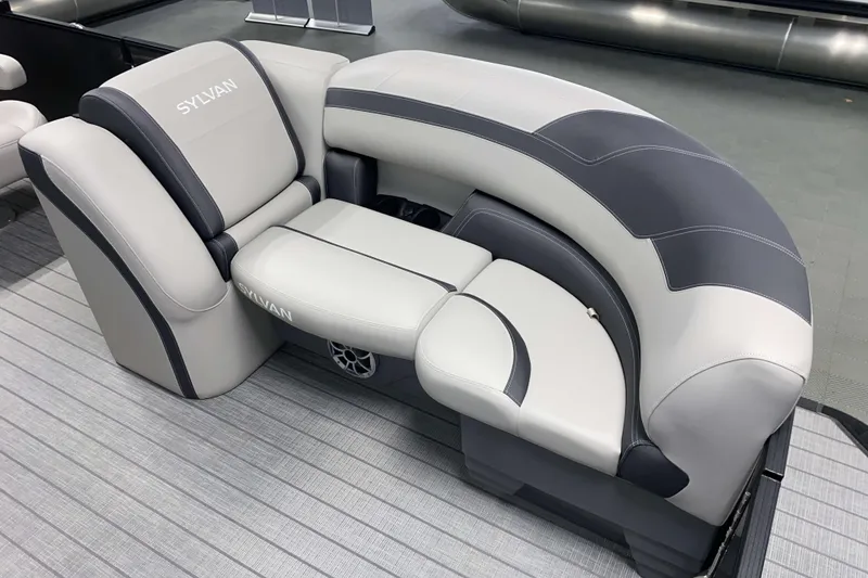 Slide: The Image of Luxurious 2025 Sylvan L3 LZ boat seating with sleek gray and black upholstery. - 2