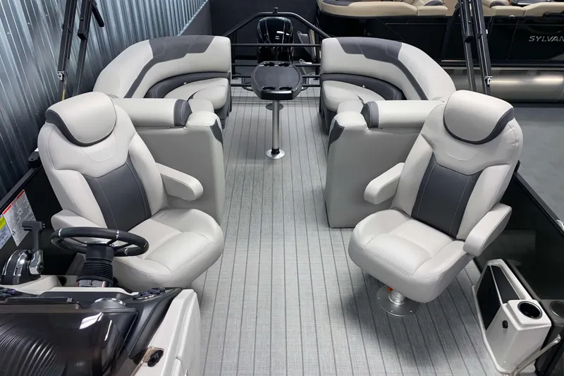 Slide: The Image of Luxurious interior of 2025 Sylvan L3 LZ pontoon boat with plush seating and modern design. - 4