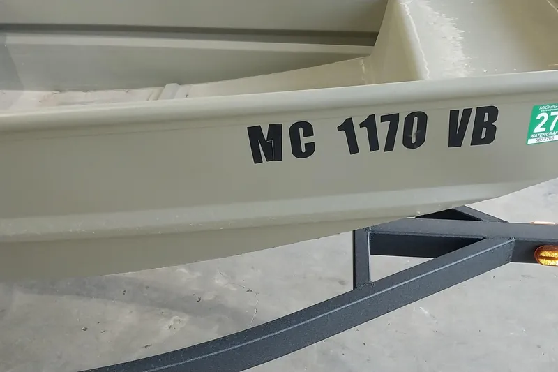 Slide: The Image of 2025 Tracker Grizzly 1436 Utility boat with registration number MC 1170 VB. - 3