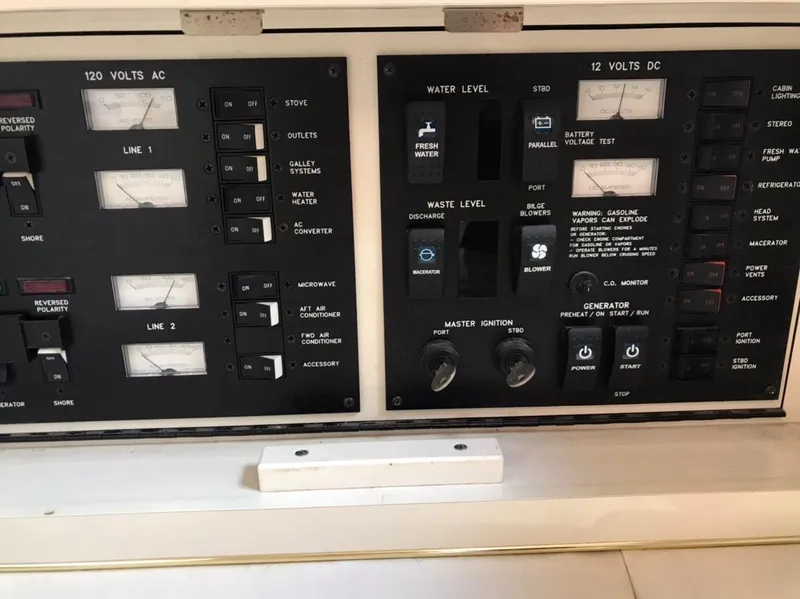Slide: The Image of Electrical control panel of a 1997 Sea Ray 330 Express Cruiser boat. - 8