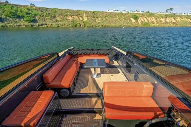 Slide: The Image of Luxurious 2015 VanDutch 40 yacht with elegant seating on a serene waterway. - 22