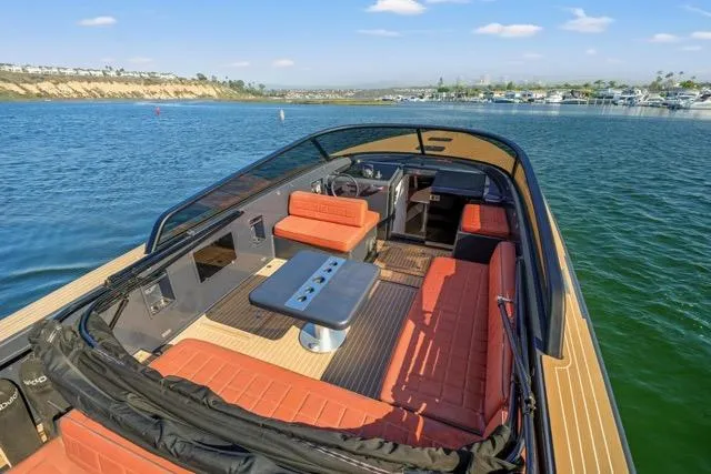 Slide: The Image of Luxurious 2015 VanDutch 40 yacht with spacious seating and elegant design on serene waters. - 28